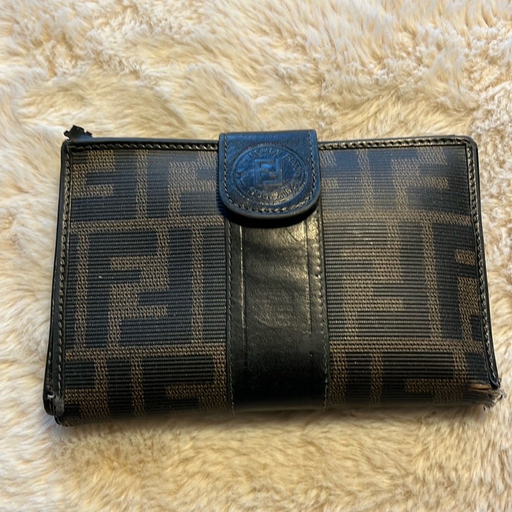 Fendi compact wallet, still in good condition, could use restitching on corner.